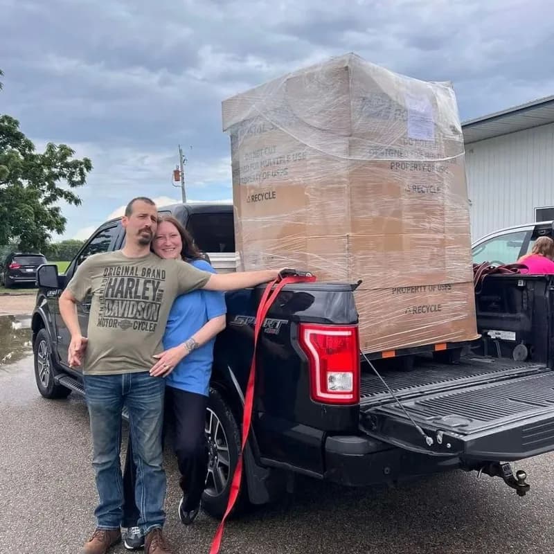 Customer collecting pallets at the warehouse